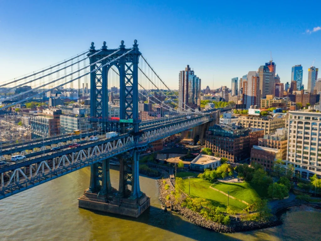 Best Weekend Getaways from NYC: Top Picks for 2025 Historic Freedom Trail and vibrant cityscape of Boston, MA – perfect weekend getaway from NYC with spring cherry blossoms and cozy dining at Tavern on State.