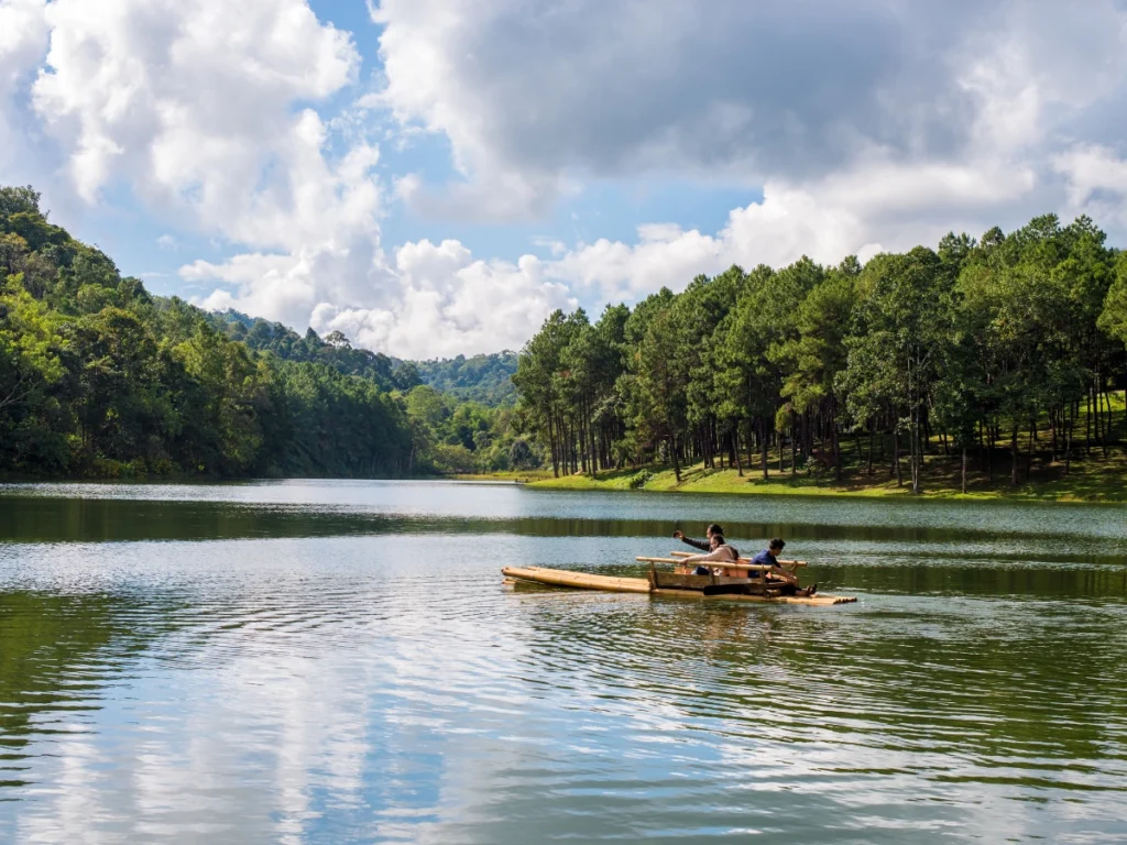 Best Weekend Getaways from NYC: Top Picks for 2025 Scenic view of Mirror Lake with Adirondack Mountains in the background, perfect for hiking, kayaking, and winter skiing in Lake Placid, New York